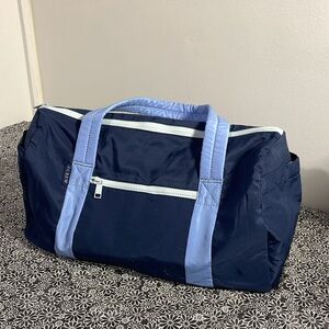 NWT - J crew duffel/travel bag with 7 pockets navy and light blue